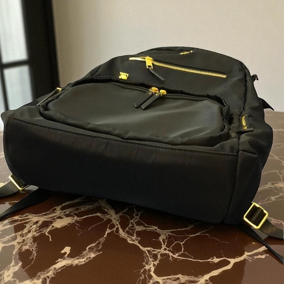 Tumi ✨Black and Gold Backpack✨ with Modern Design - Picture 3 of 6